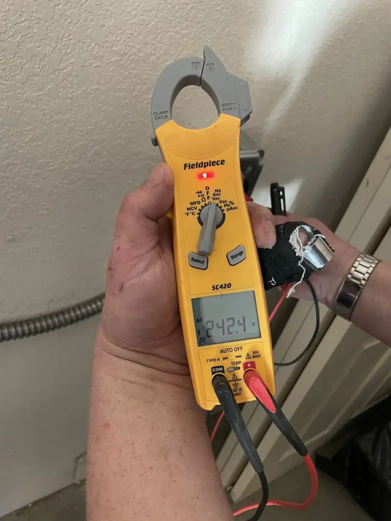 Voltage testing with clamp meter during Outlet Installation in Sterling
